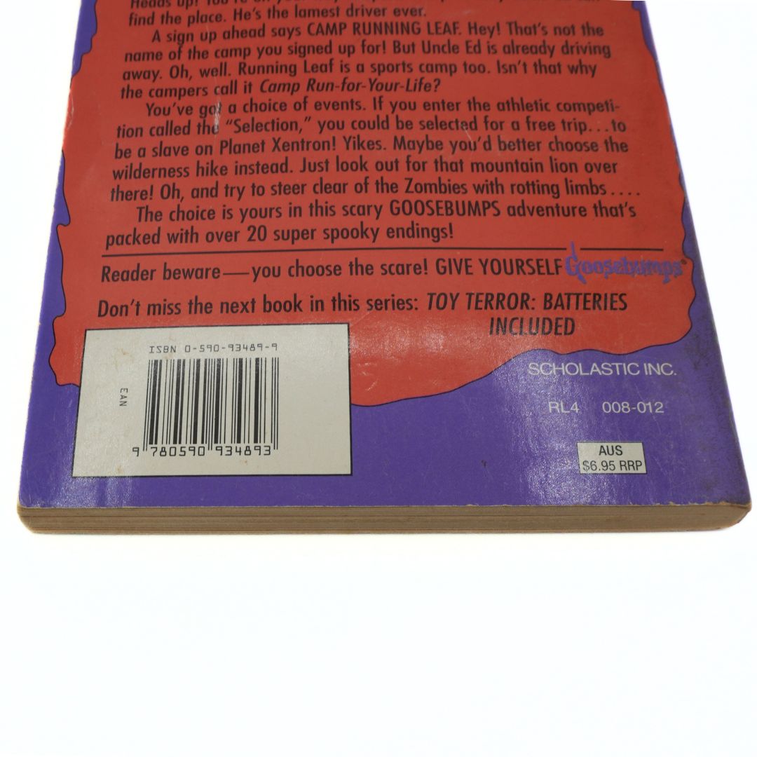 Back cover of a Goosebumps book with text and branding