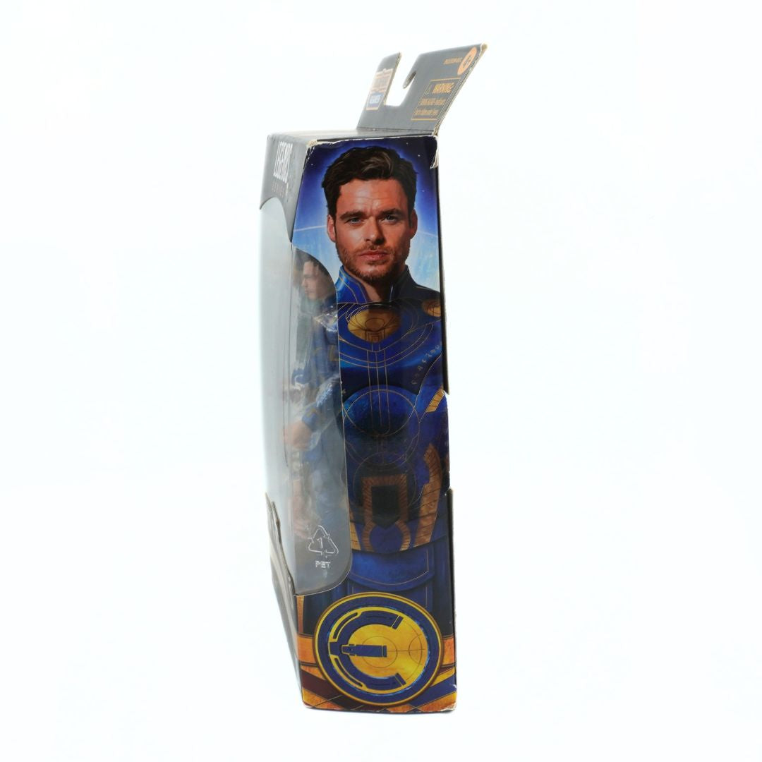 Toy figure in packaging with character design on a white background