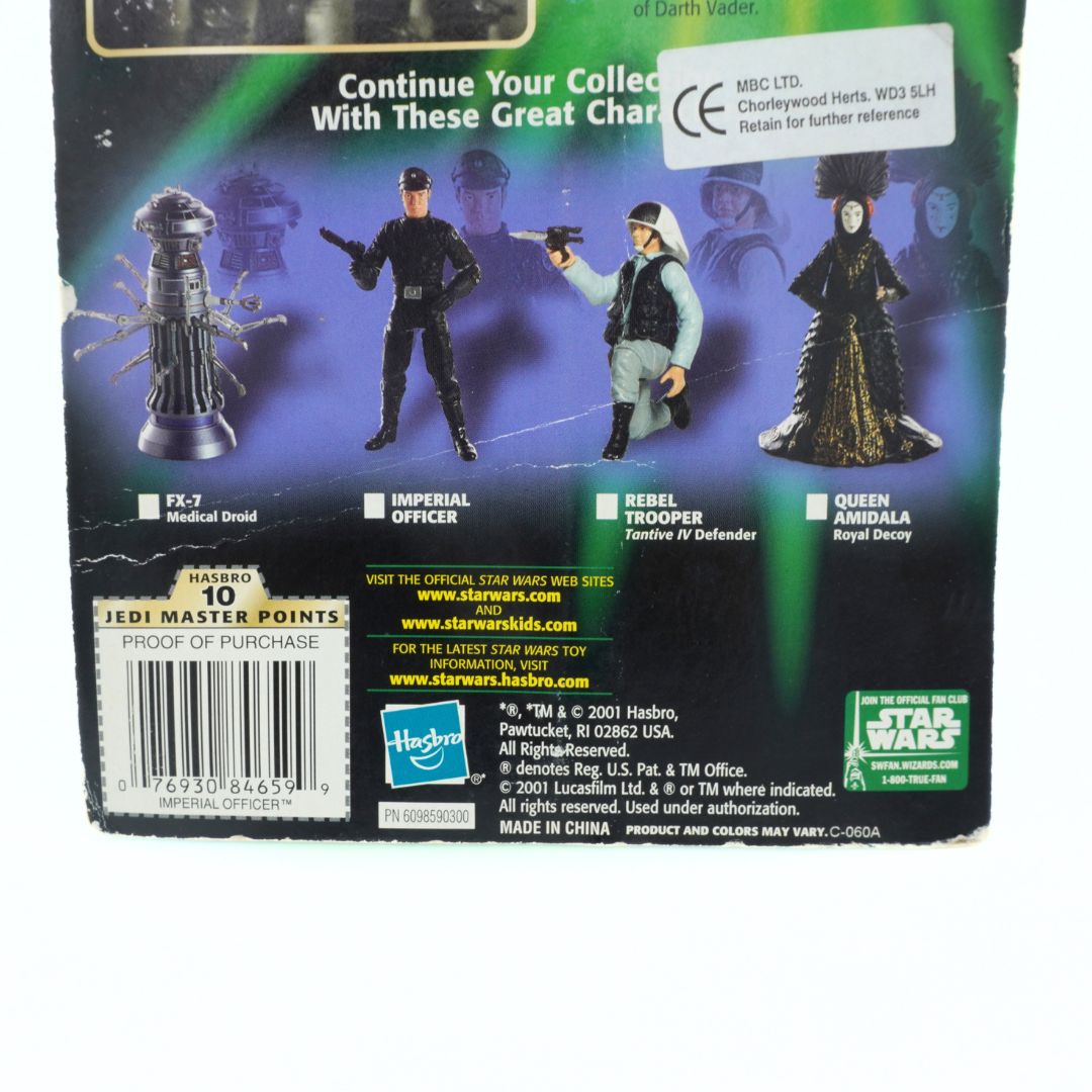 Star Wars action figure packaging with characters and branding.