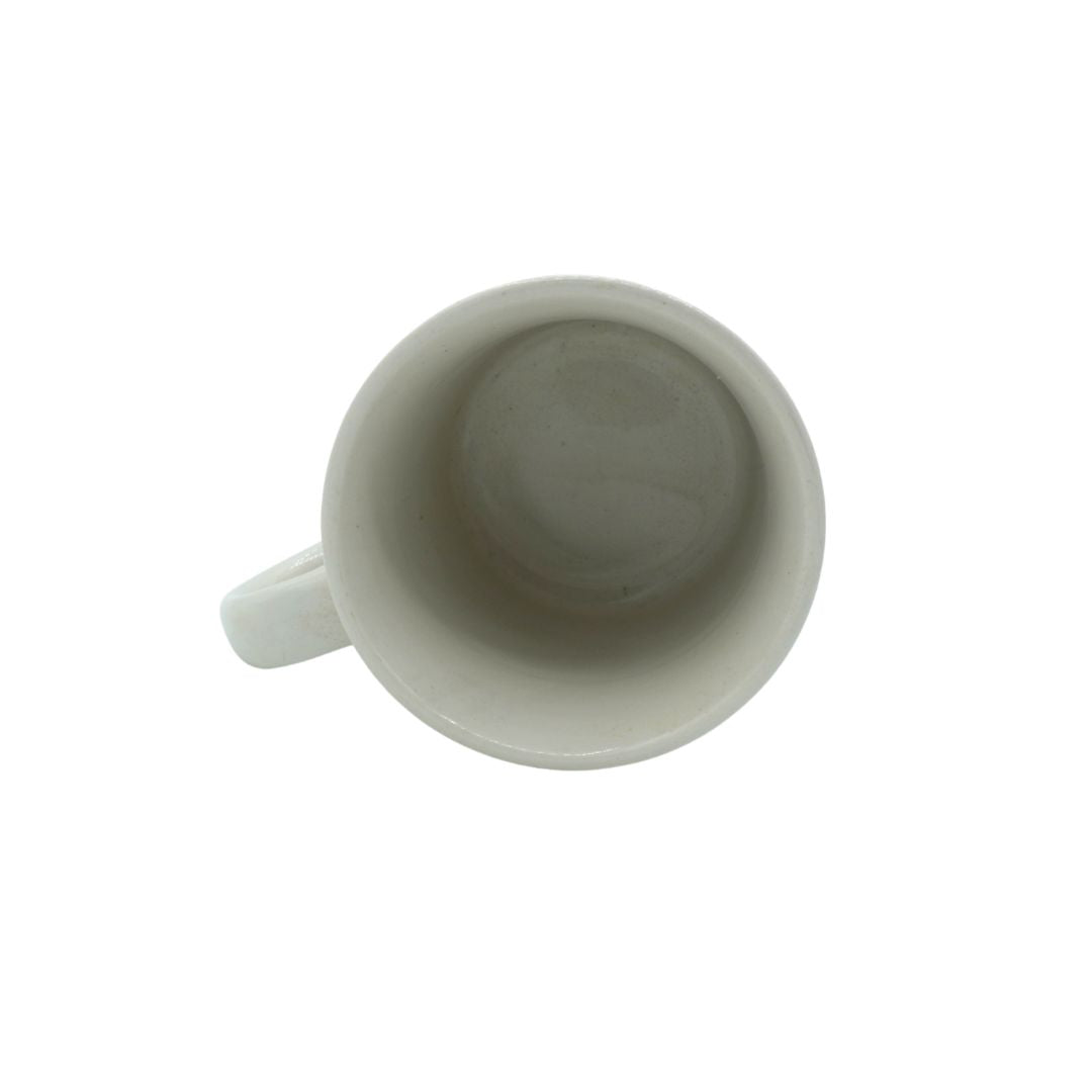 White ceramic mug on a white background