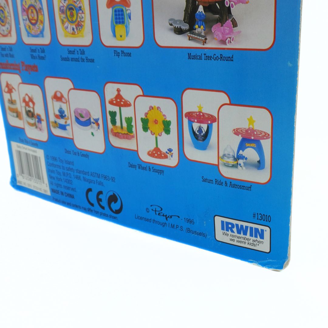 Toy packaging with various illustrations and IRWIN branding on a blue background