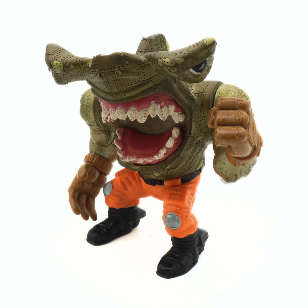 Toy figure with a green and brown design on a white background