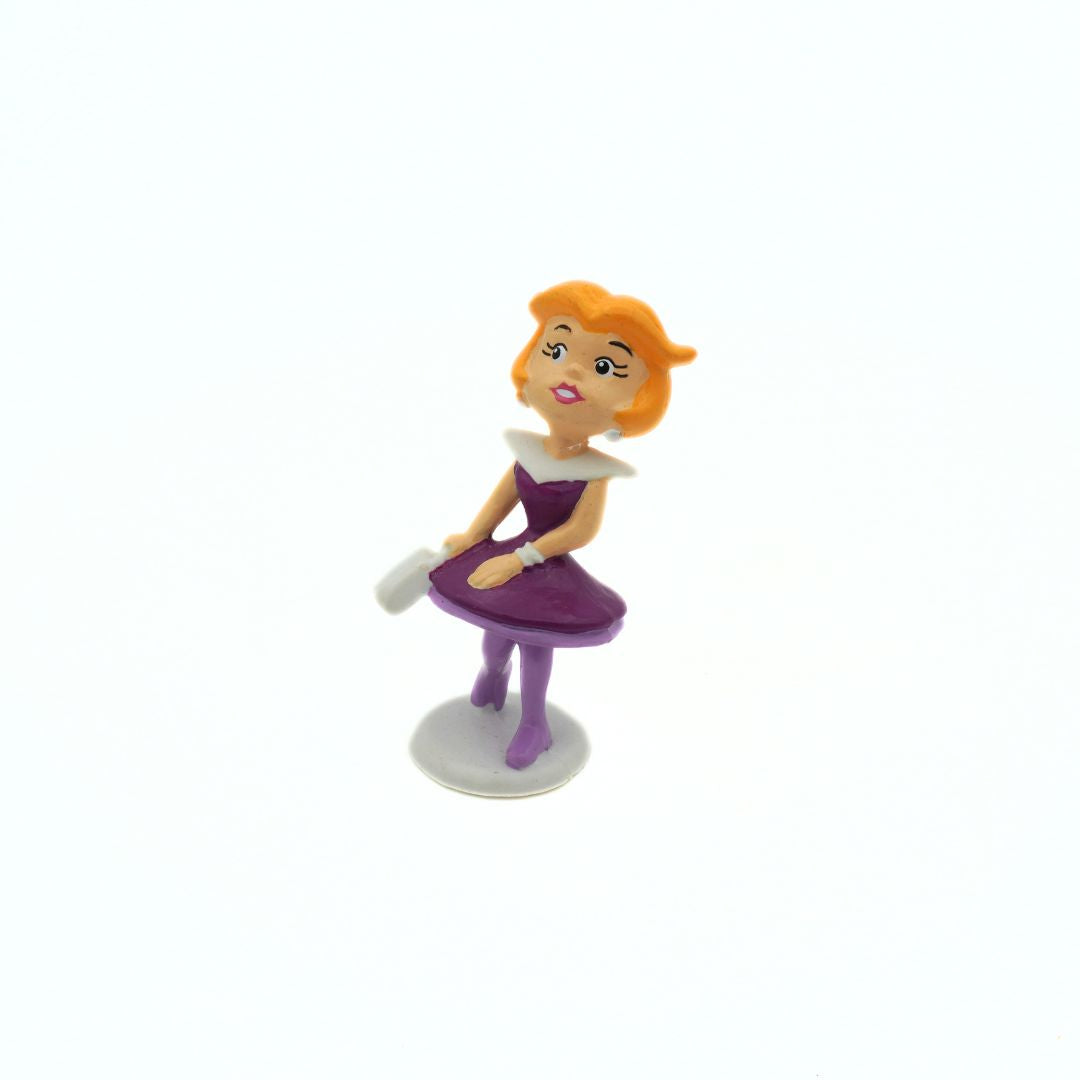 1990 Jane Jetson figurine with a purple dress and white handbag