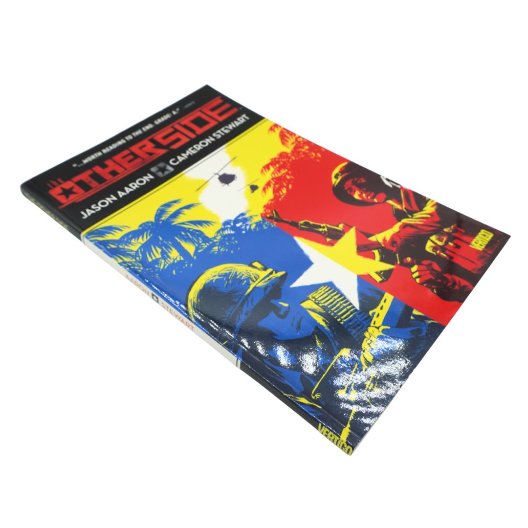 Front cover of the Other Side issue 1-5 volume with a blue, red and yellow design.
