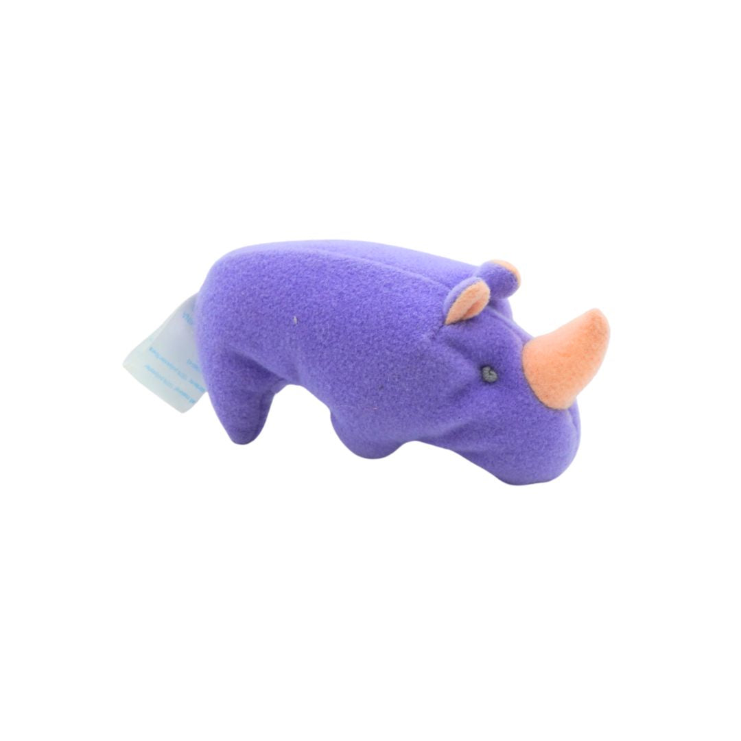 Purple rhino-shaped toy with a white base on a white background