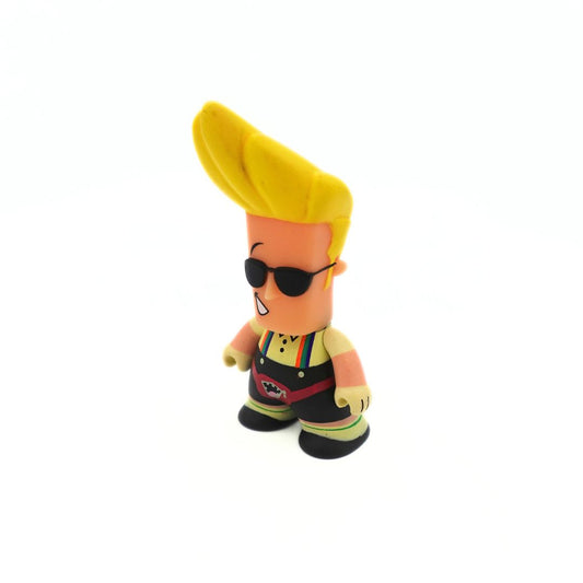 A small Johnny Bravo figure wearing a button up shirt, overalls and a bumbag