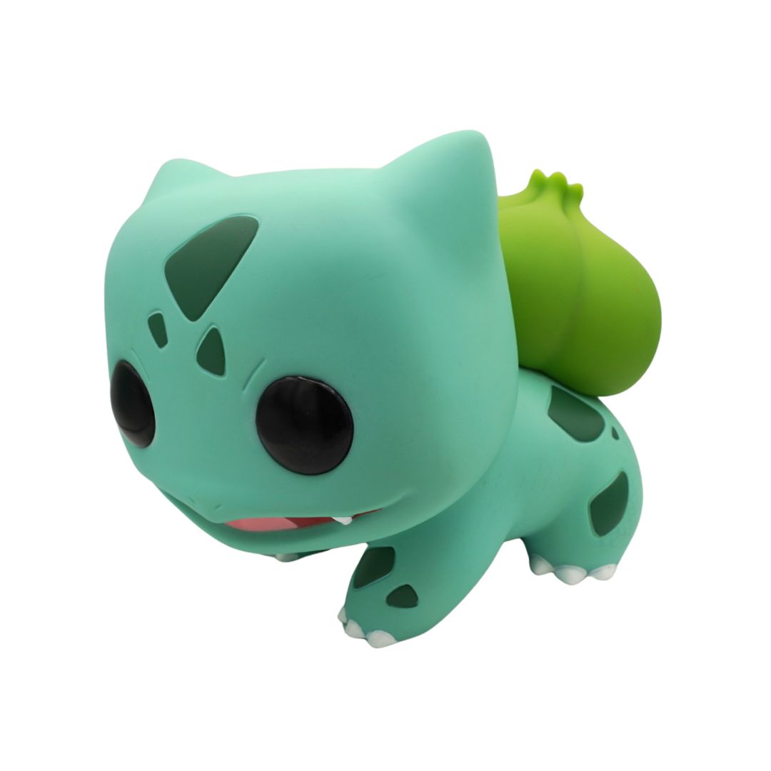 Green cartoon character with a shell on a white background