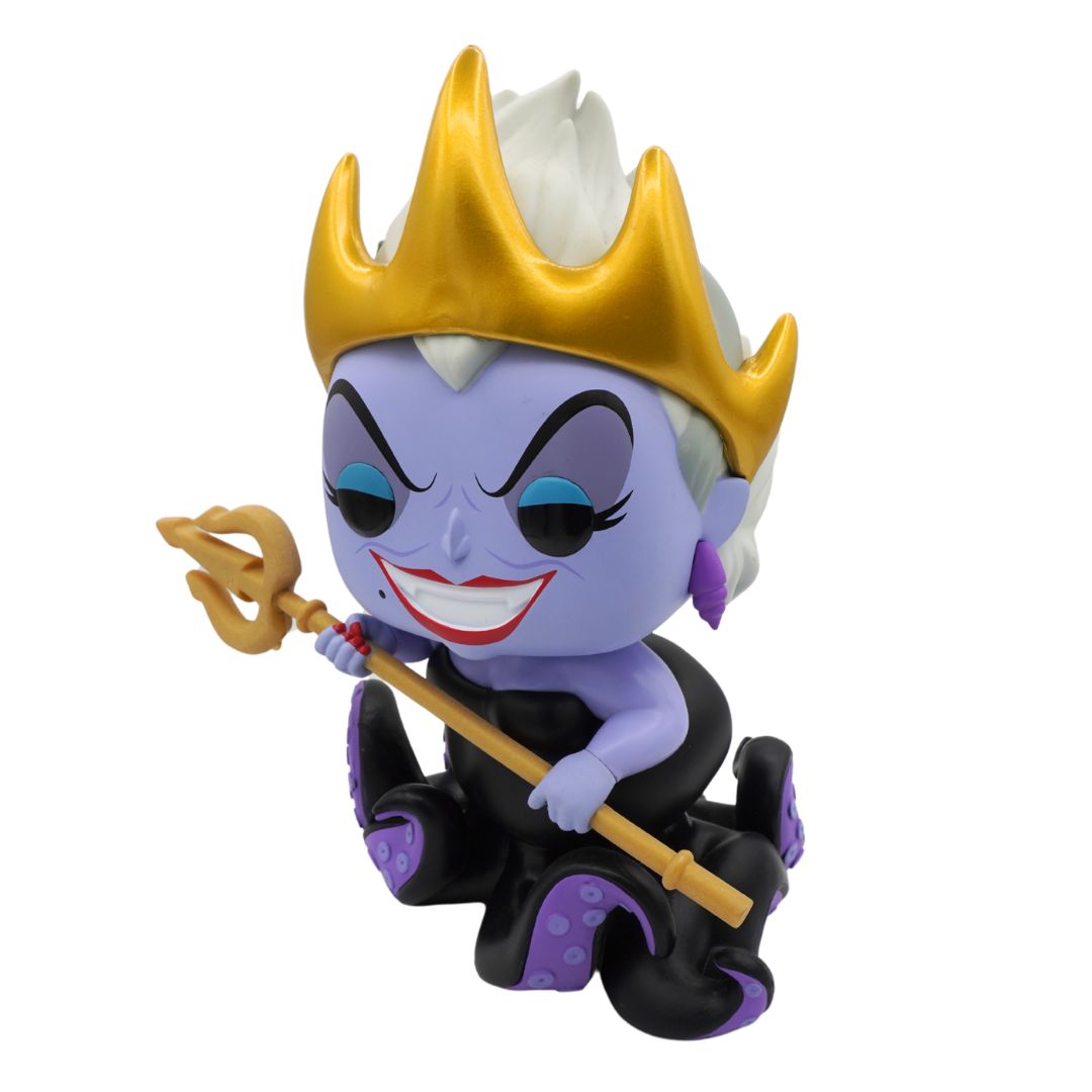 Jumbo sized purple Ursula figurine from the Little Mermaid with a gold crown and black dress
