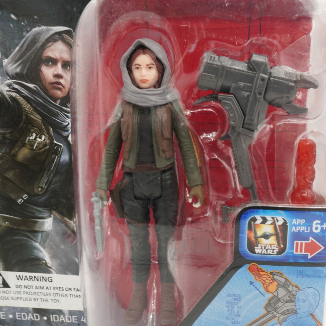 Star Wars action figure in packaging with character illustration on the side