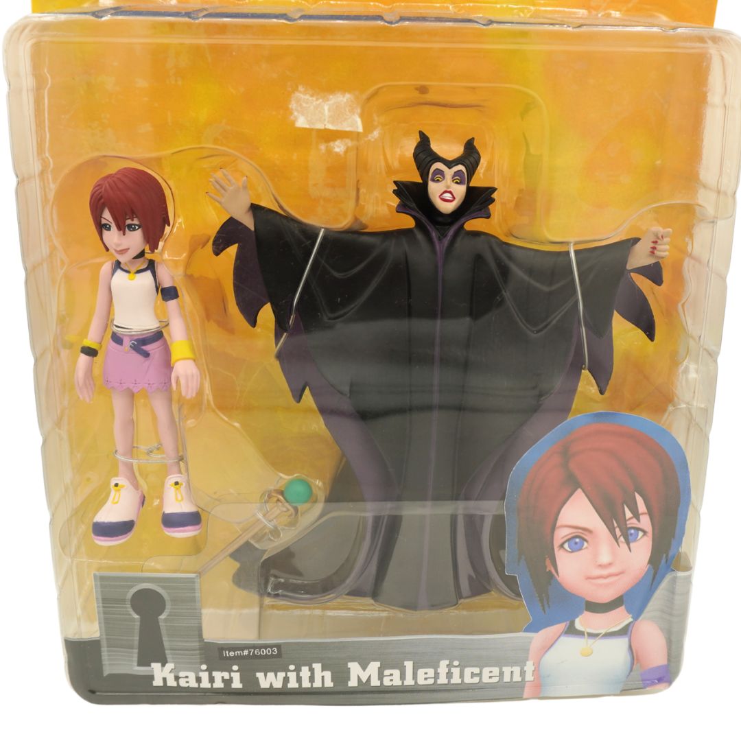 Kingdom Hearts Kairi with Maleficent action figure set in its original blister packaging, featuring Kairi and Maleficent with a character illustration on the box.