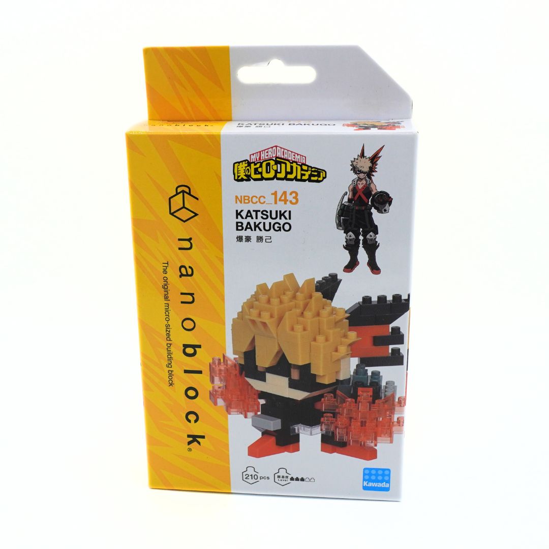 A boxed Nanoblocks NBCC 143 Katsuki Bakugo toy building block set, shown in its retail packaging against a plain white background.