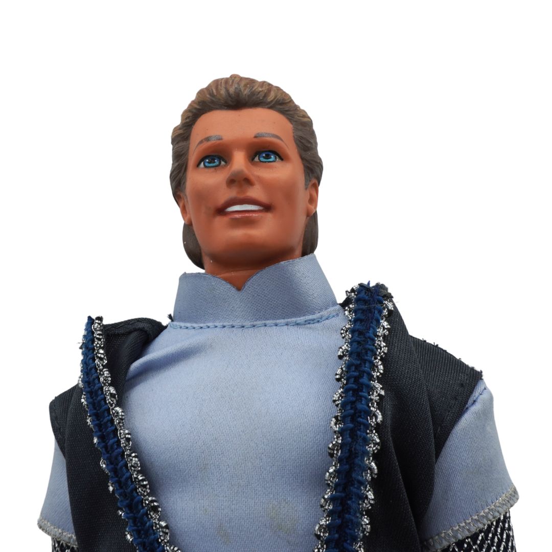 Action figure with a blue outfit and black vest on a white background