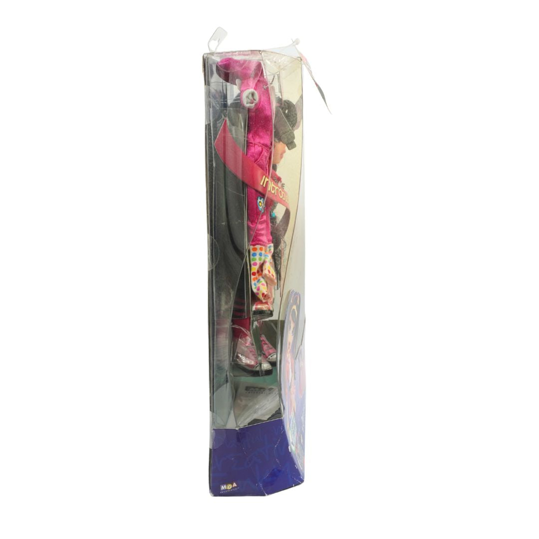 Packaged toy with a pink dress and accessories on a white background