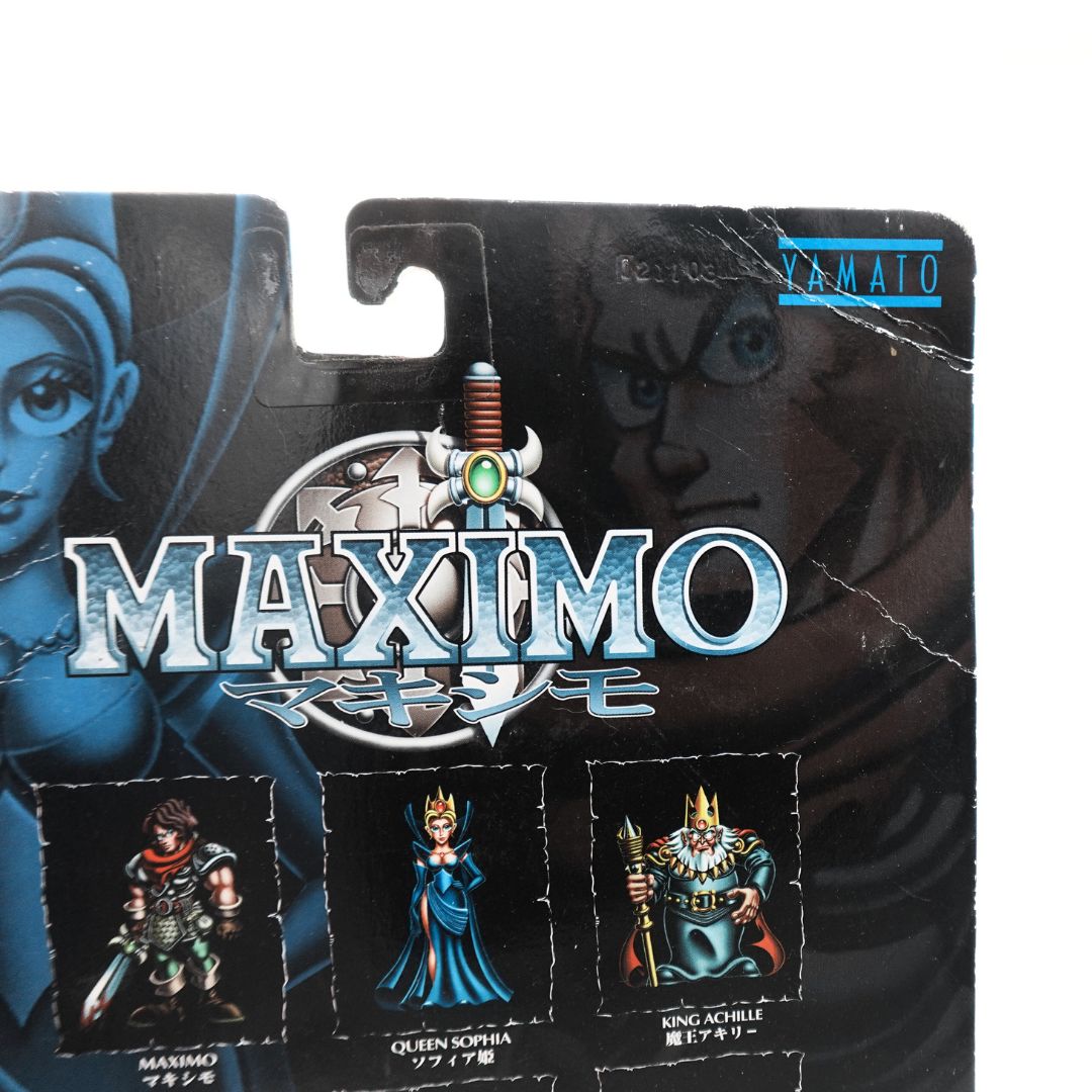 Corner of the King Achille Maximo figurine cardback showing creasing over the Yamato branding