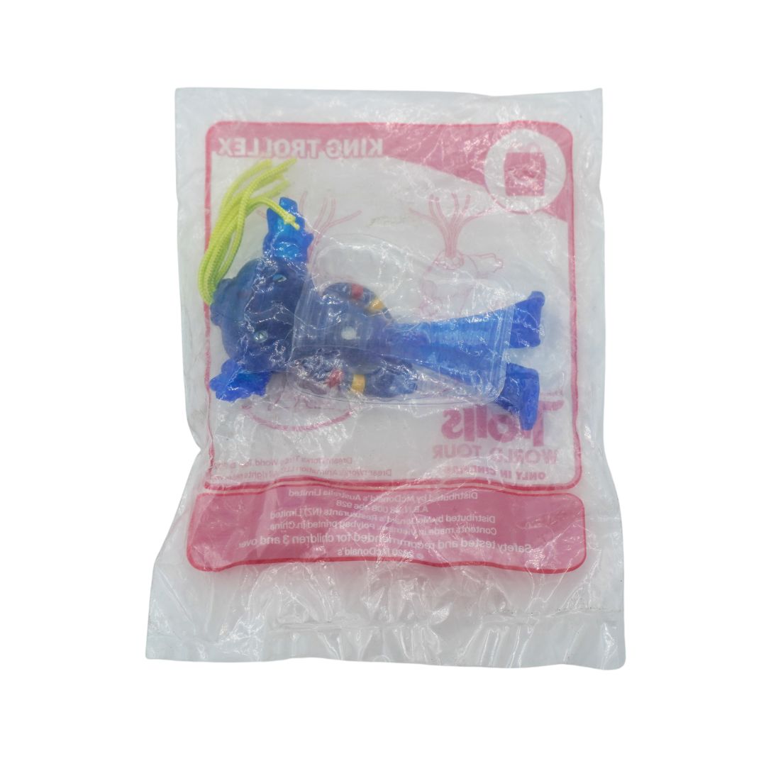 A vintage 2020 King Trollex action figure in its original Happy Meal packaging, featuring a blue figure with yellow hair and a pink printed card backing.