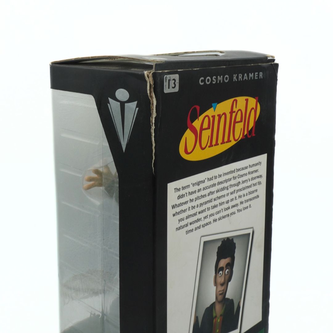 Seinfeld Cosmo Kramer action figure packaging with brand logo and character image.