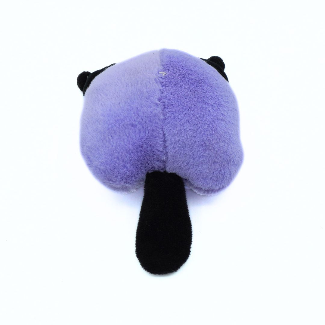 A novelty plush toy shaped like a stylized rear view of a cat, featuring a fuzzy lavender-purple body with black ears and tail, photographed against a plain white background.
