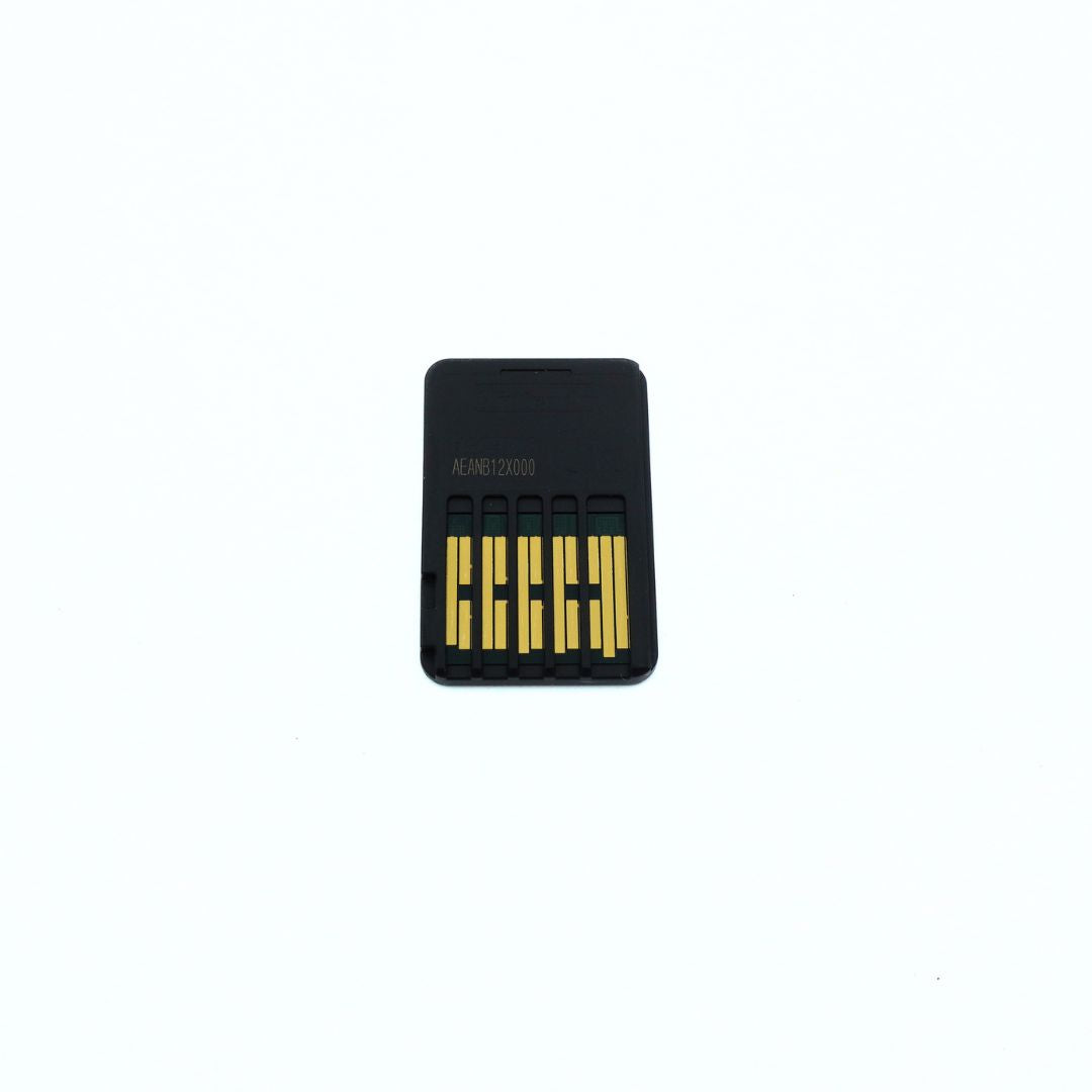 A small black rectangular electronic component with six gold metal pins on a plain white background.