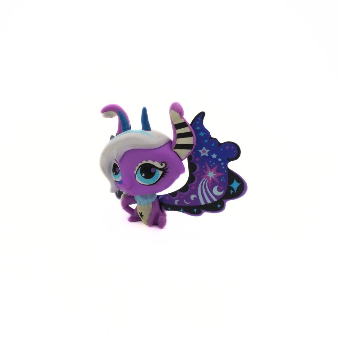 Toy figure with purple and white design on a white background