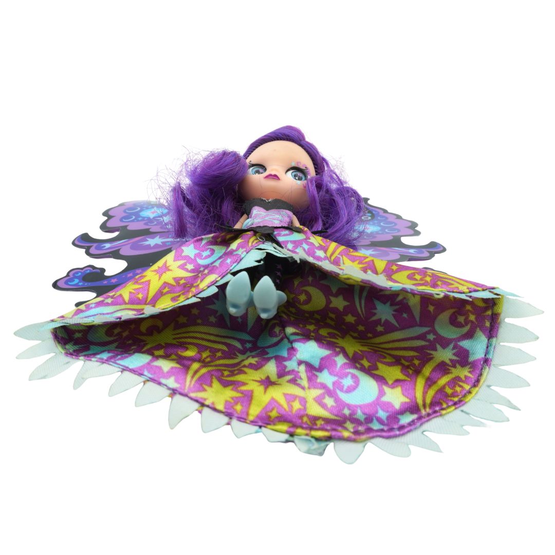 Toy fairy with purple hair inside a colorful fabric wingsuit on a white background