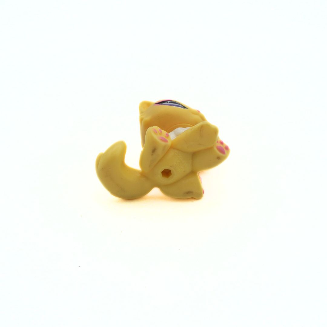 Underside of a yellow Persian Cat from Littlest Pet Shop