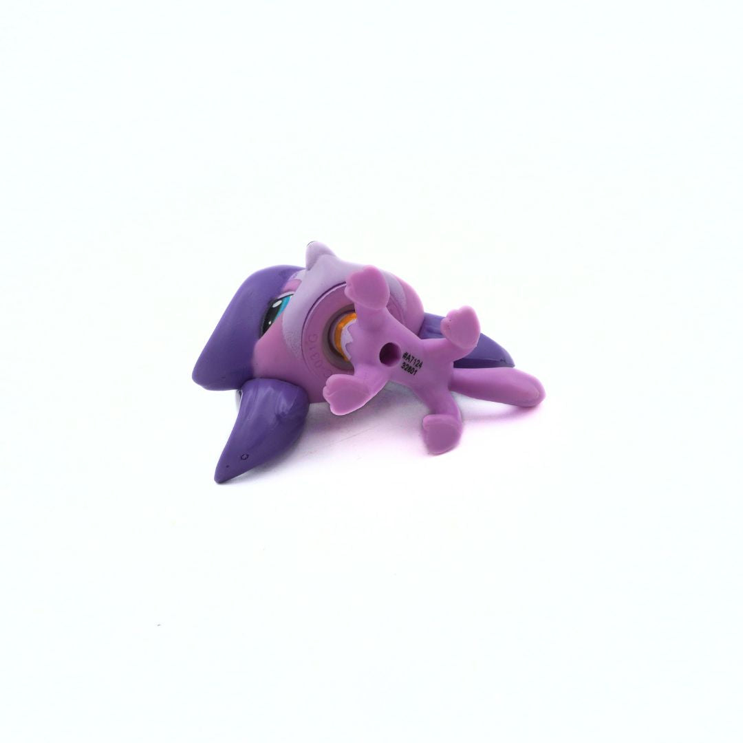 Purple and pink toy figure on a white background