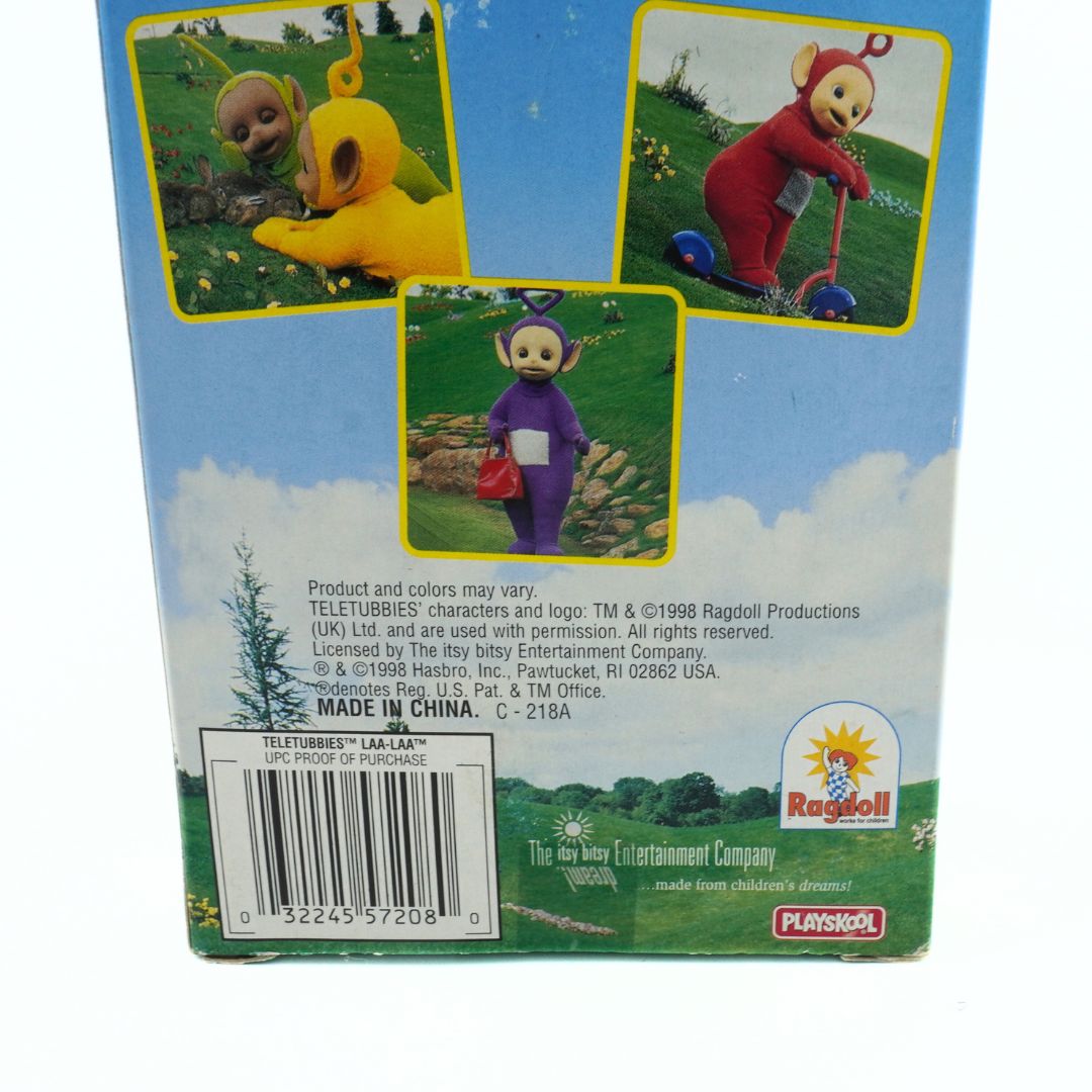Back of a Teletubbies toy packaging with images of the characters and branding details.