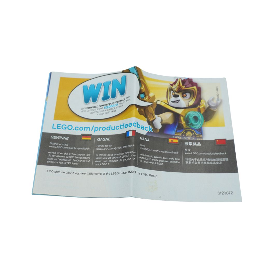 A crumpled paper insert or flyer featuring LEGO branding, a cartoon character, and a large 'WIN' speech bubble, photographed on a plain white background.