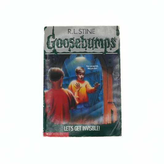 Vintage 'Goosebumps' book titled 'Let's Get Invisible!' by R.L. Stine on a white background