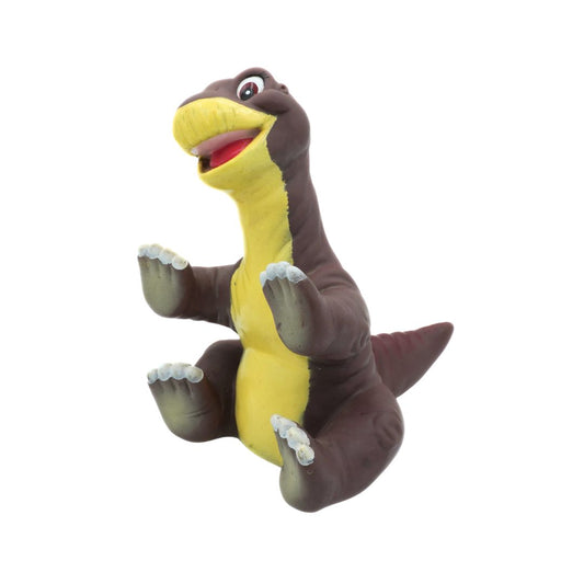 Plastic toy dinosaur with brown and yellow colors on a white background