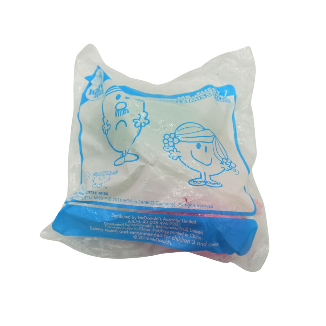 A sealed McDonald's Happy Meal toy bag featuring Little Miss in blue line art on a white background, with a blue band at the bottom.