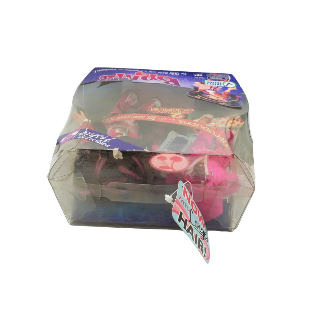 Packaged Bratz doll with colorful packaging on a white background
