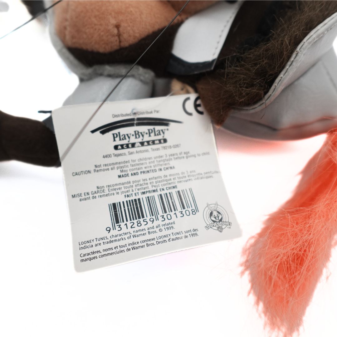 The barcode tag attached to a 90's Taz Devil plush from Looney Tunes and Play-By-Play