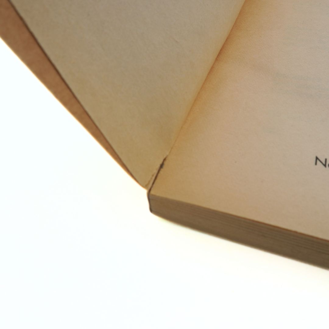 Close-up of a book corner on a white background