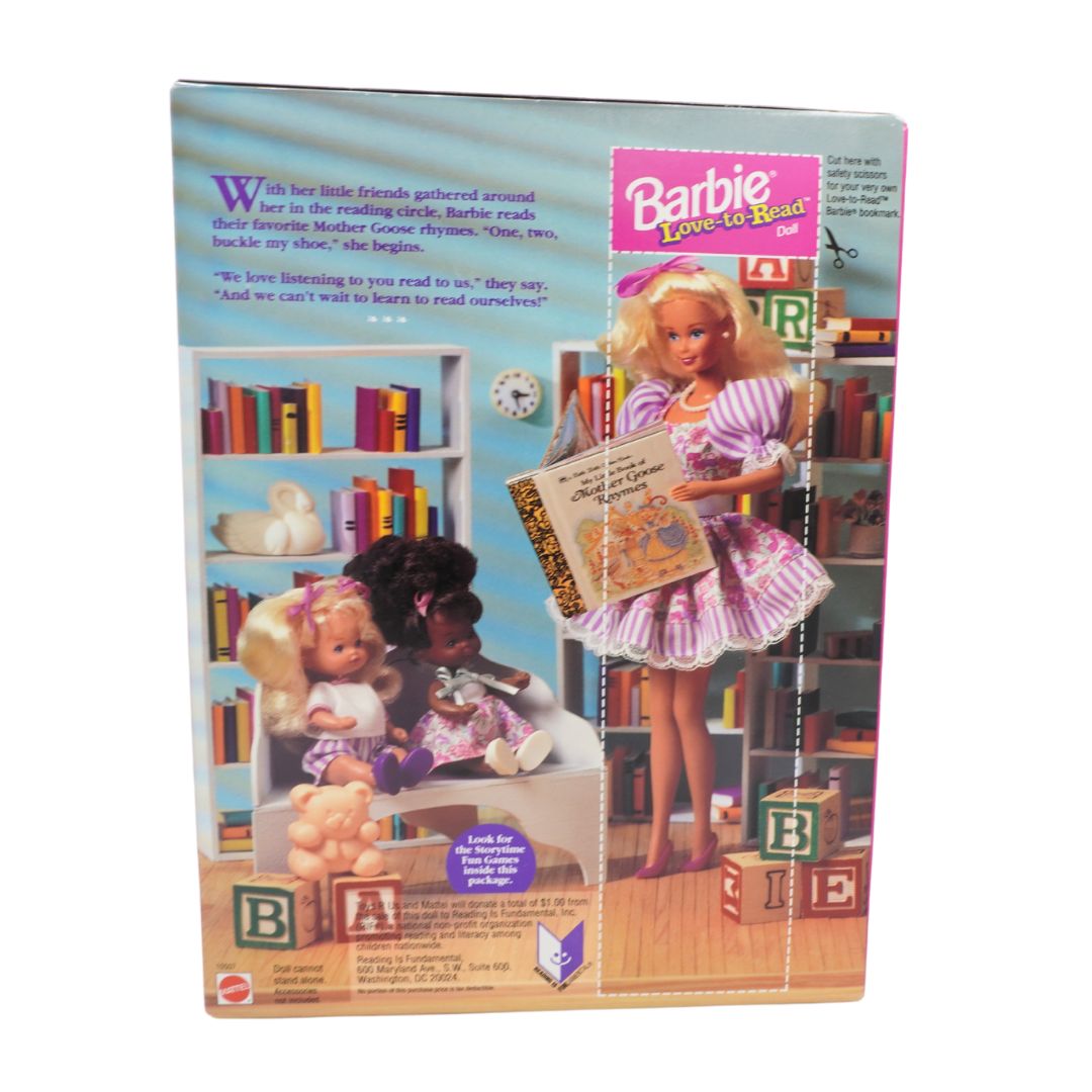 Barbie toy set packaging with dolls and books on a white background
