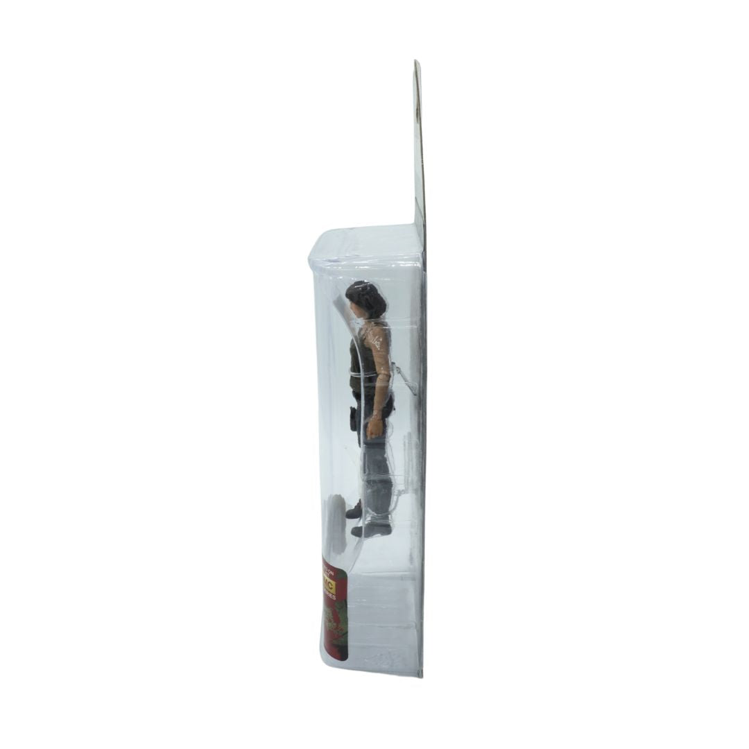 Maggie Greene figurine in packaging, seen from a side angle