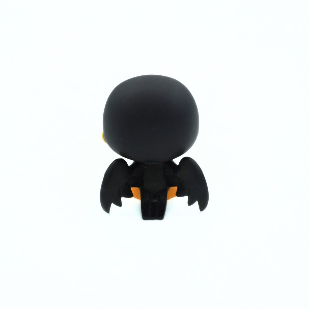 A small black bird-shaped figurine or accessory with tiny orange accents, shown from the back on a plain white background.