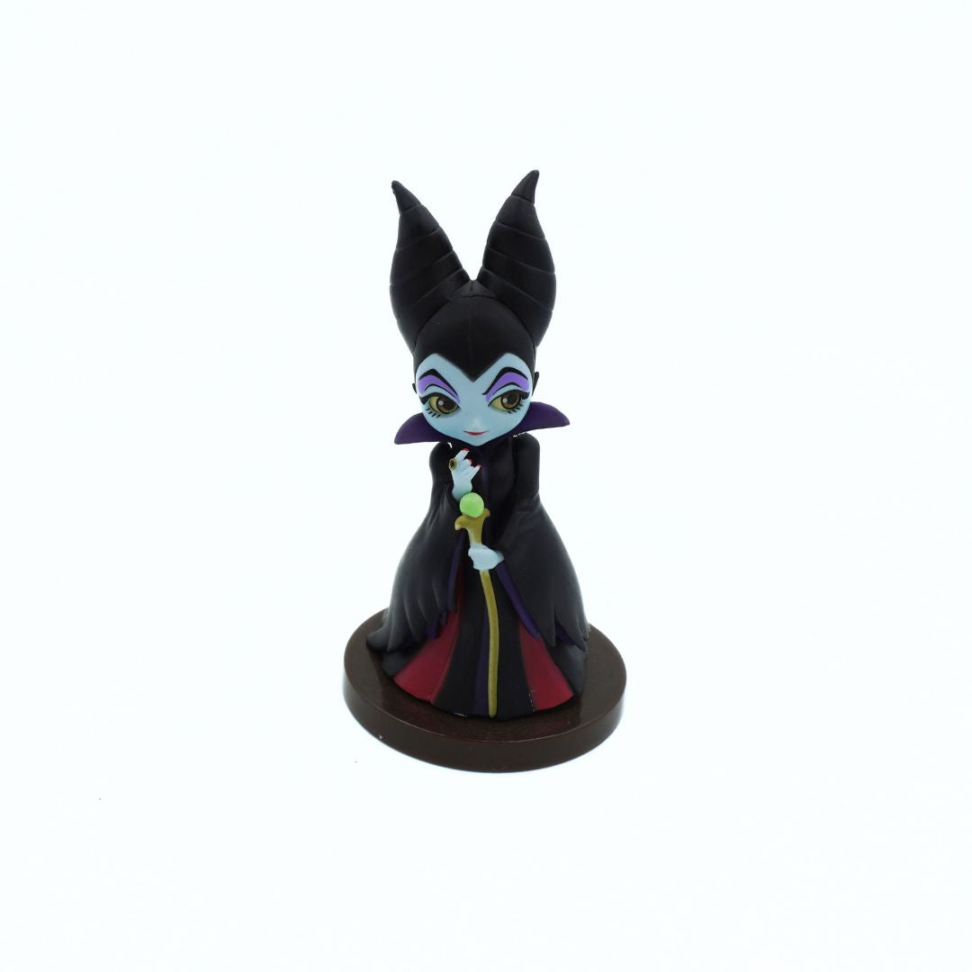 Small Maleficent figure wearing black and standing on a small stand