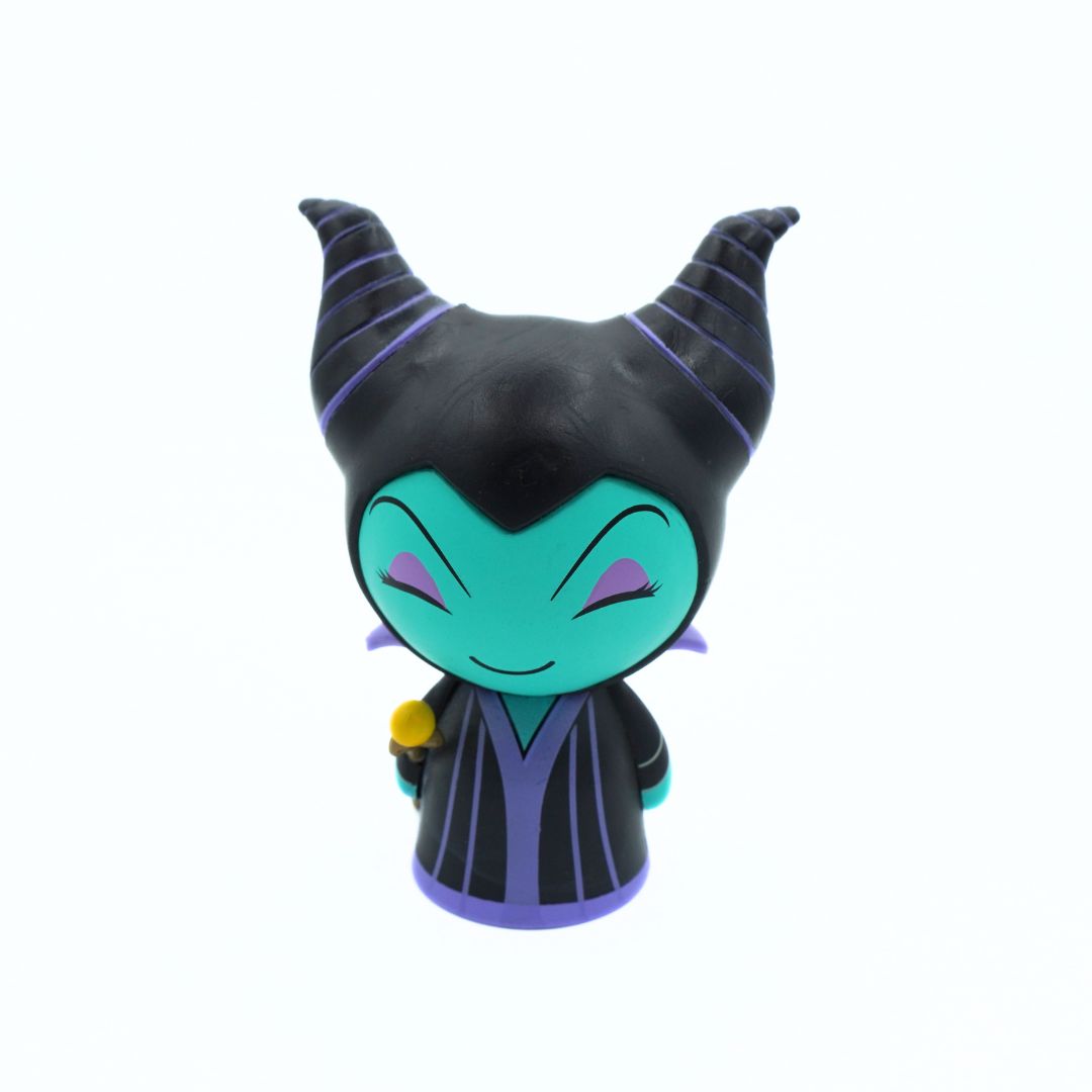 A stylized chibi collectible figure of Maleficent from Disney's Sleeping Beauty, featuring her signature black horns, teal skin, and purple and black outfit, set against a plain white background.