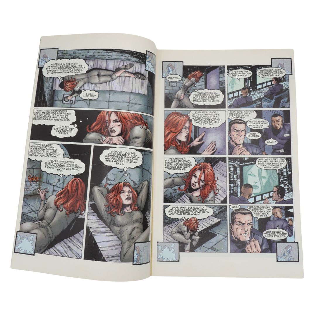 Open comic book with panels showing a woman and a man in various poses.
