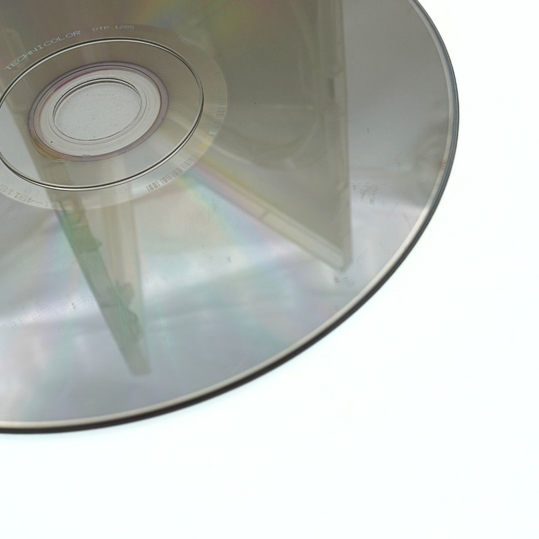 Close-up of a CD or DVD on a white background