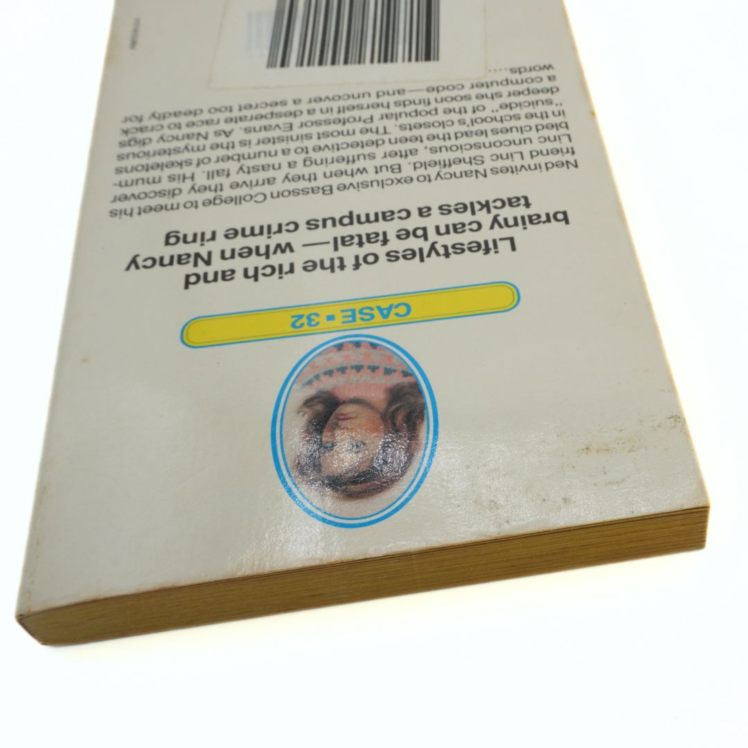 Back cover of a book with text and a circular image of a camel's face.