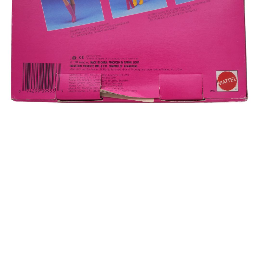 Back of a pink toy box with Mattel logo on a white background