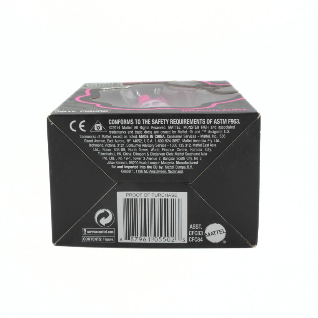 Back view of a toy packaging box with branding and safety compliance information on a white background