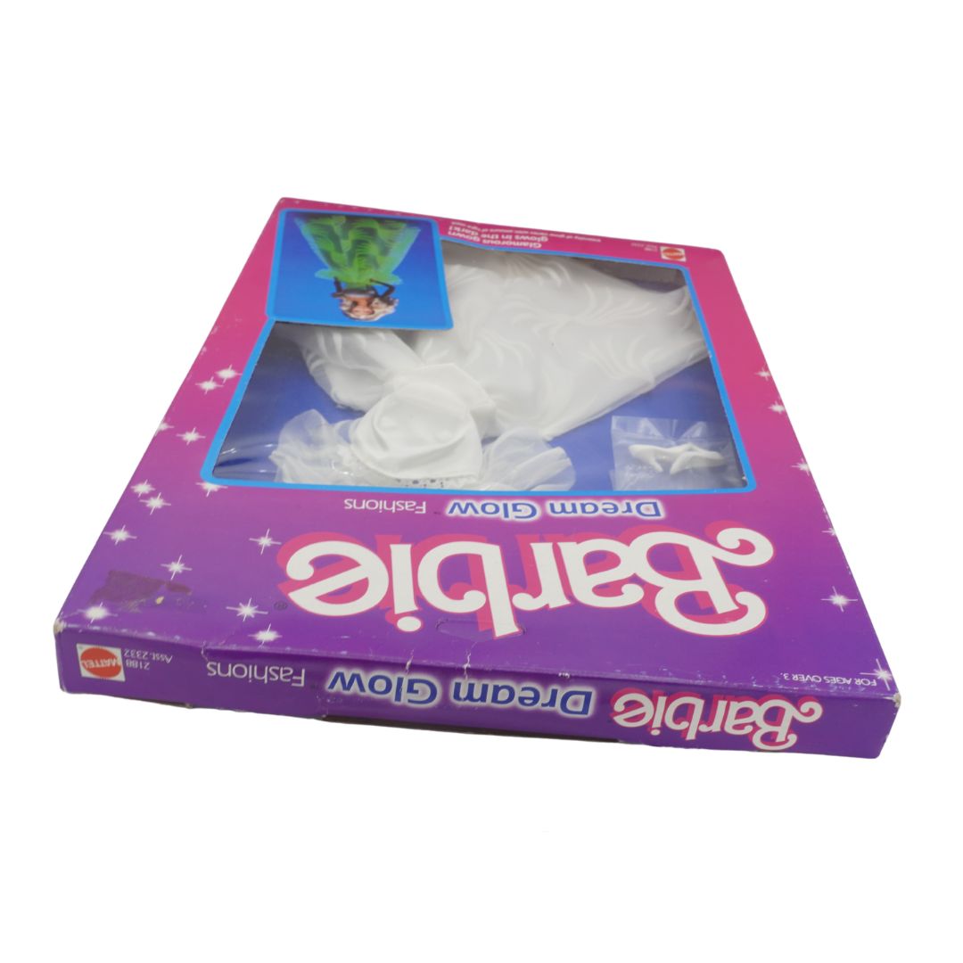 Barbie Dream Glow Fashions packaging with a white dress inside on a white background