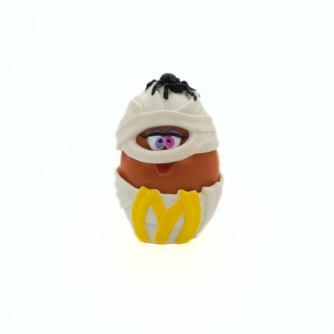 A vintage 1992 McDonalds Halloween McNugget Buddy, released as a Happy Meal toy, with a spider on its head