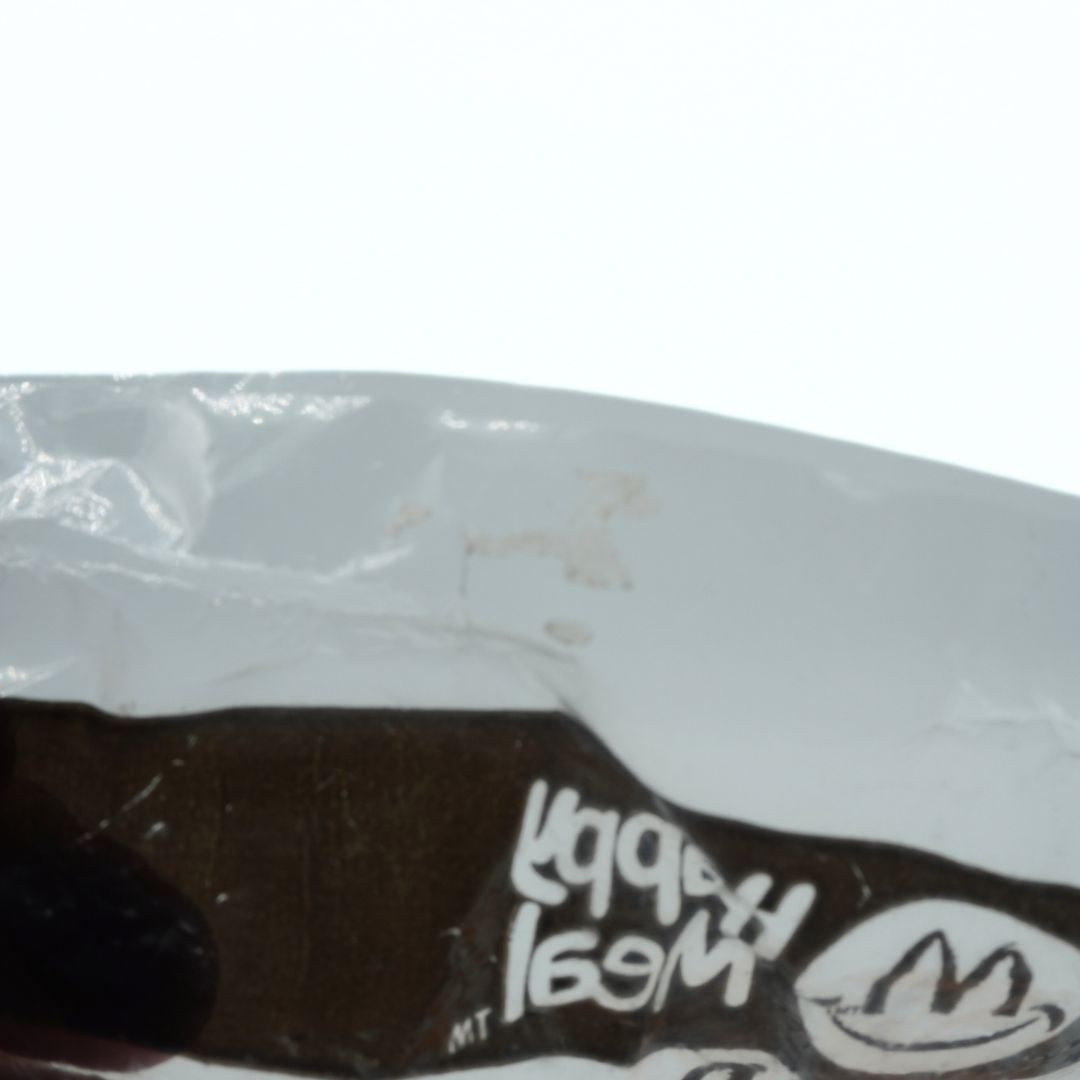 Close-up of a plastic bag with text and graphics on a white background