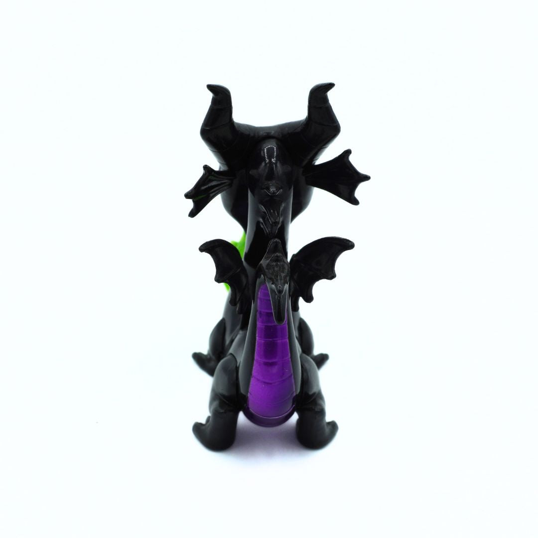 A small black dragon figurine with a glossy purple underbelly and neck, photographed against a plain white background.