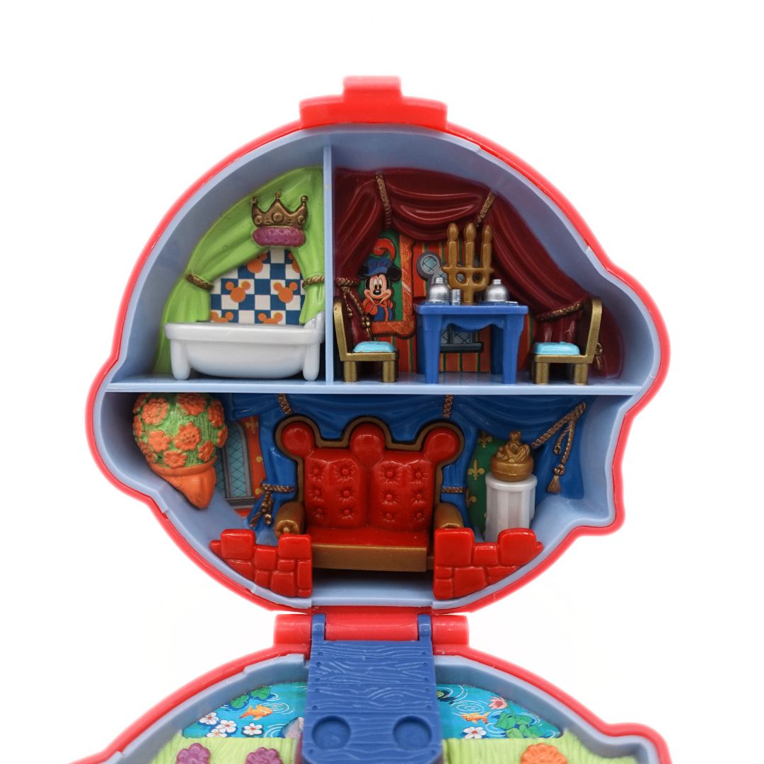 Close up of the top part of the 1995 King and Queen Disney playset featuring throne room, dining room and bathroom