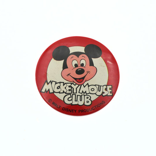 Button badge with Mickey Mouse Club logo on a white background